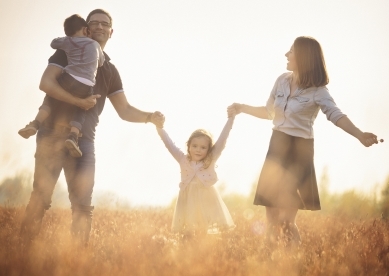 Happy family outdoors having fun